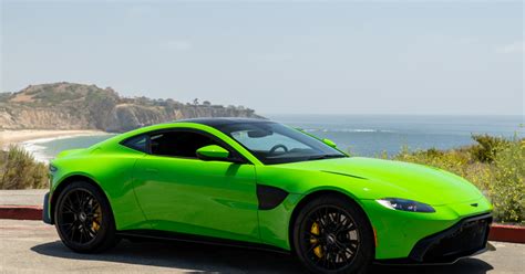 Aston martin newport beach - 2021 DB11 AMR Coupe. The Aston Martin Newport Beach Satin Collection features an all-black matte exterior and additional custom details on DBX, Vantage, DBS and DB11 models.
